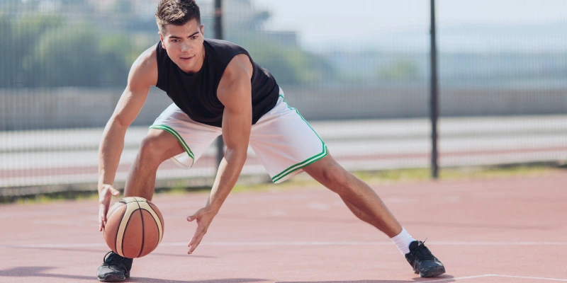 Basketball player wearing grip socks for better court control and stability