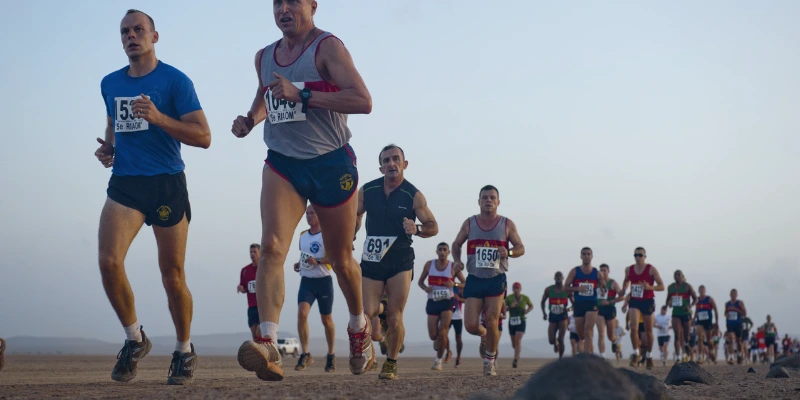 Runner wearing grip socks for long-distance running on a trail