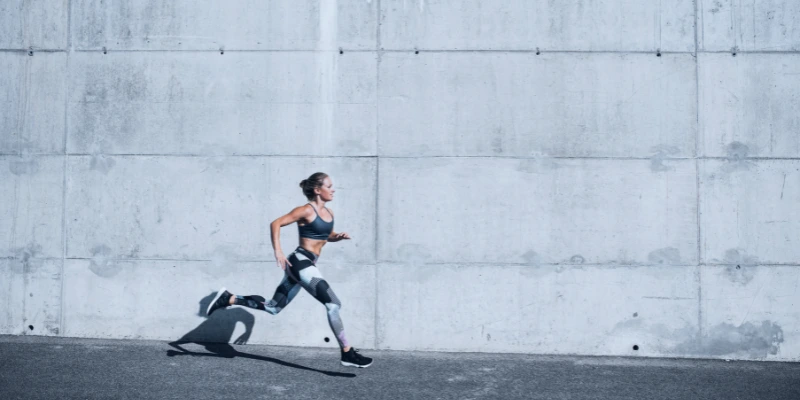 Athlete wearing grip socks for running and HIIT training
